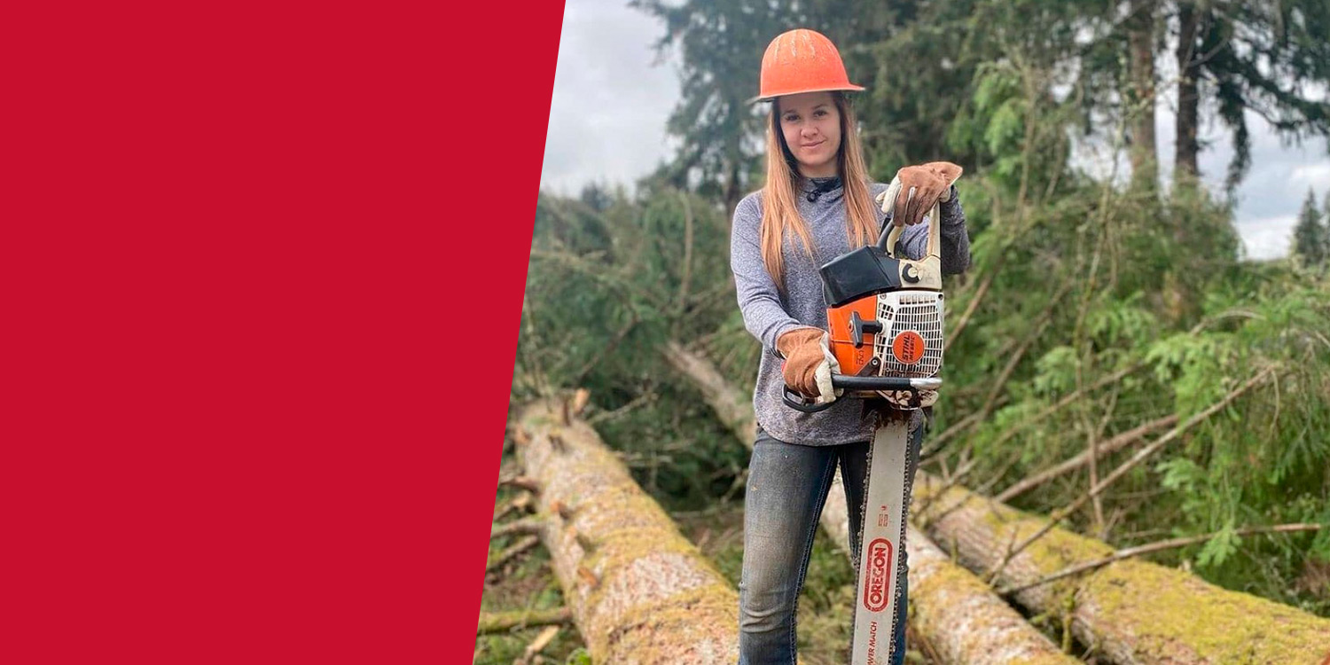 Woman standing in front trees with a Oregon saw chain